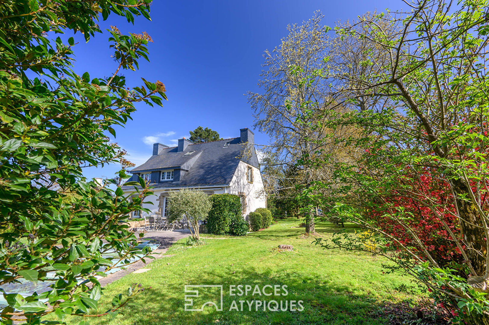 Neo-Breton house with a swimming pool and large landscaped garden in Baden, close to the golf course