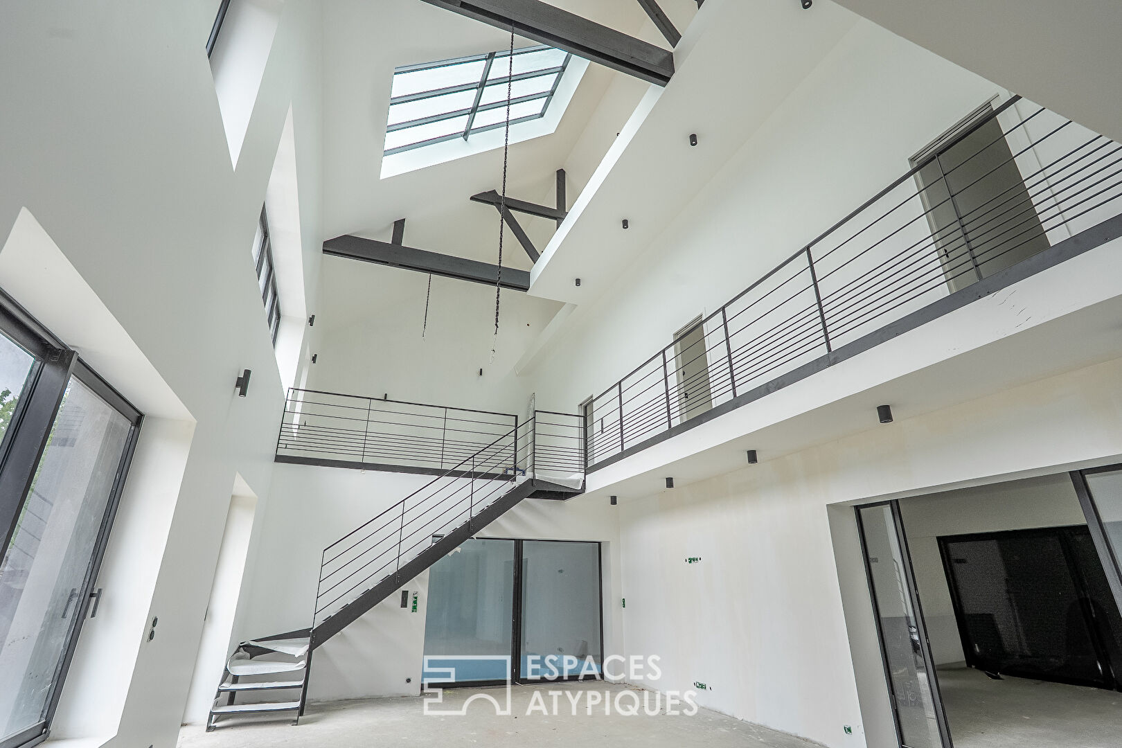 Contemporary loft facing the Blavet with swimming pool and roof terrace