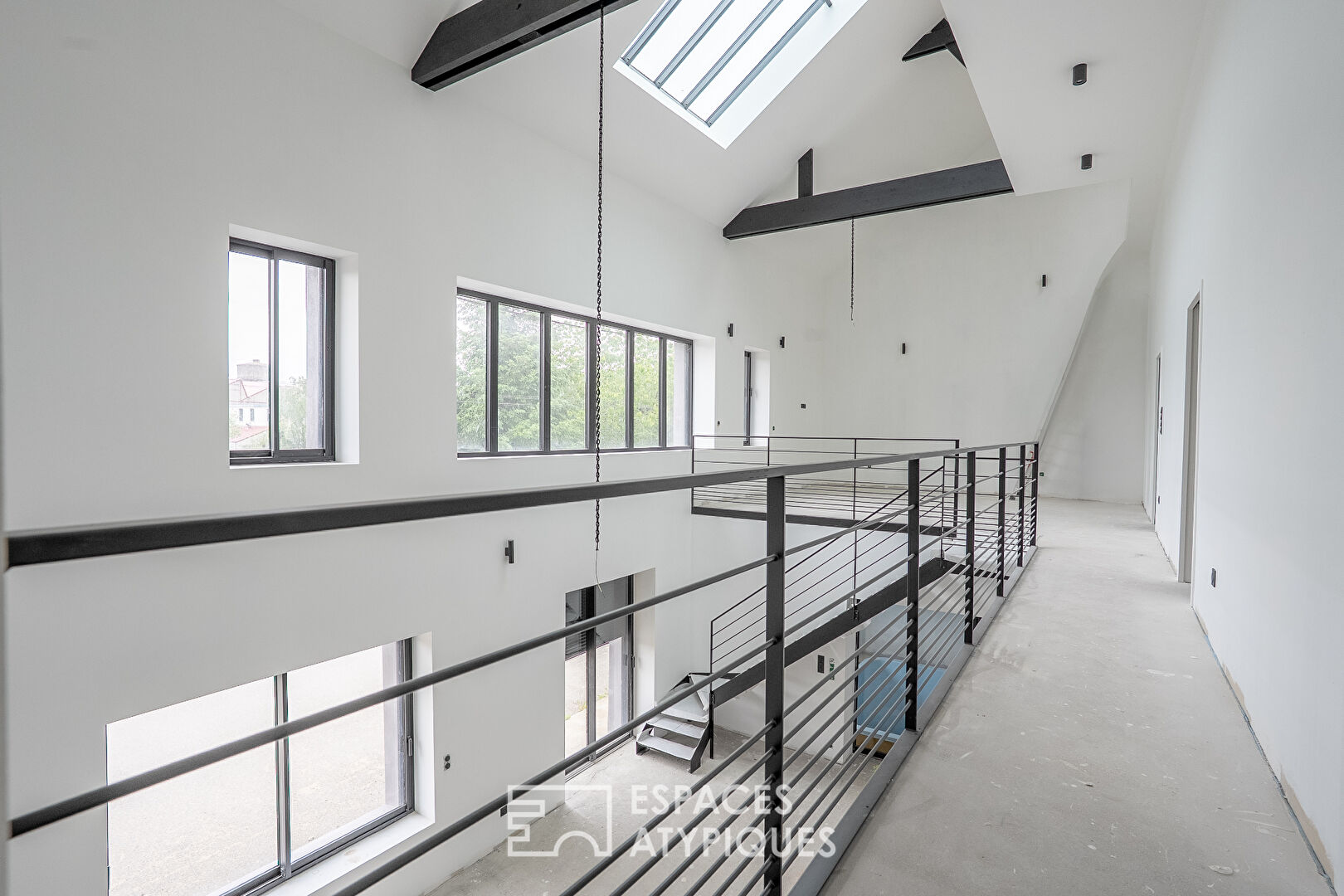 Contemporary loft facing the Blavet with swimming pool and roof terrace