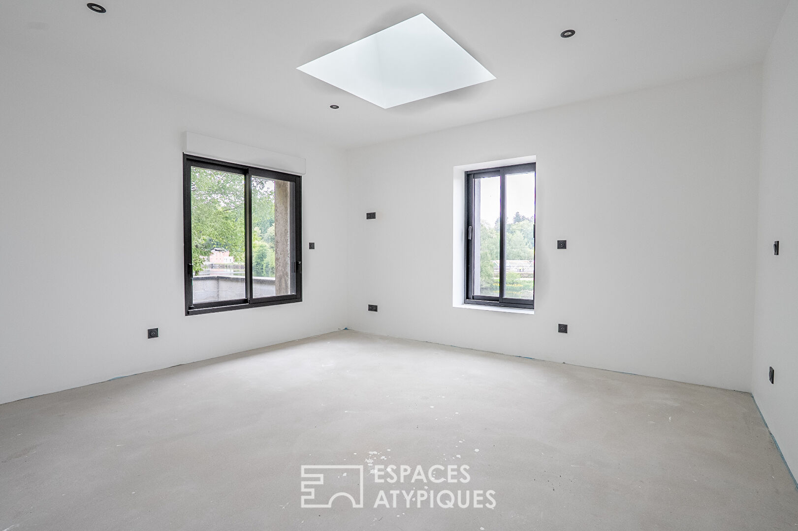 Contemporary loft facing the Blavet with swimming pool and roof terrace