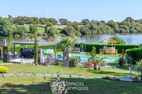 Propriété familiale avec vue contemplative sur l’eau
