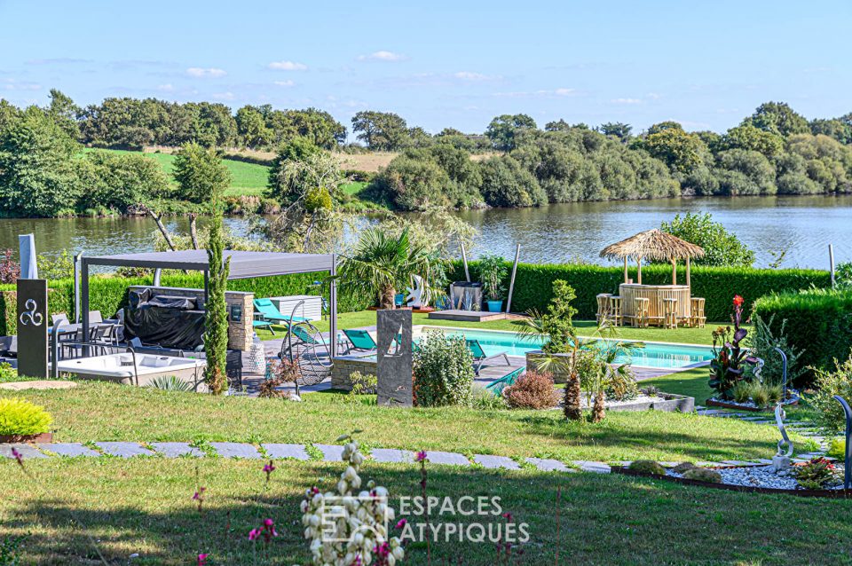 Propriété familiale avec vue contemplative sur l'eau
