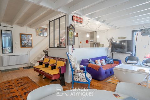 Hidden loft-style house with garden in the heart of a former workshop