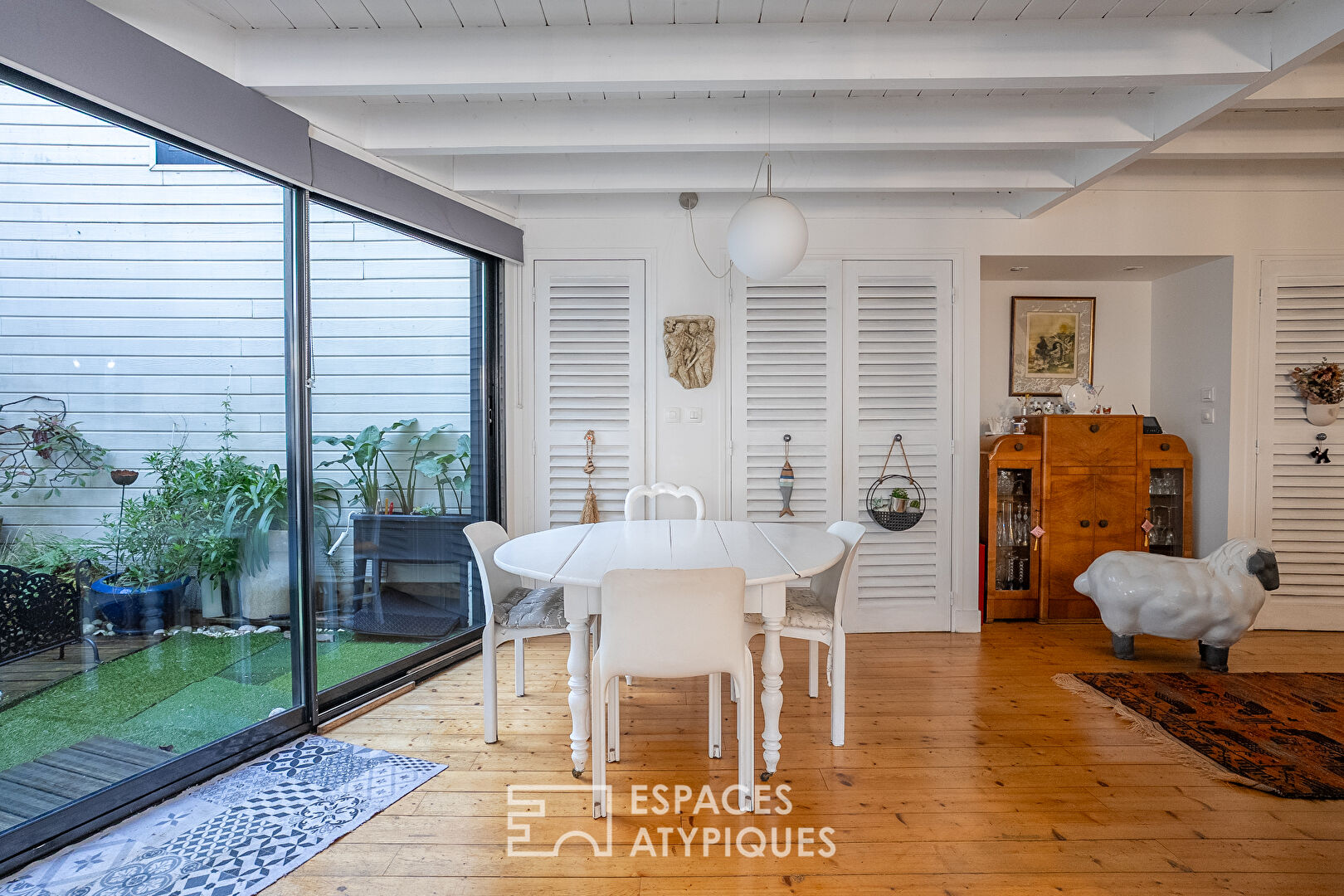 Hidden loft-style house with garden in the heart of a former workshop