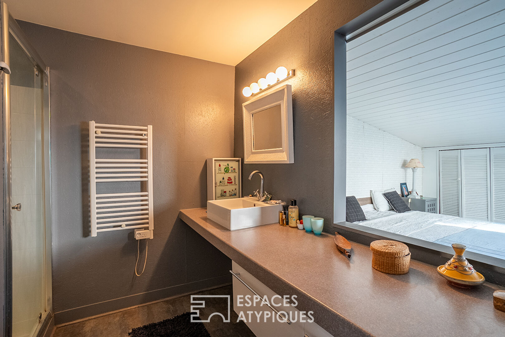 Hidden loft-style house with garden in the heart of a former workshop