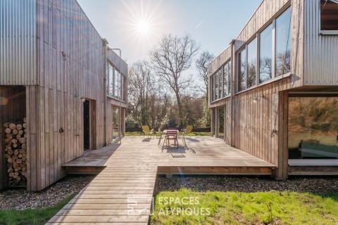 Eco-designed architect-designed house and independent workshop, just steps from the town center