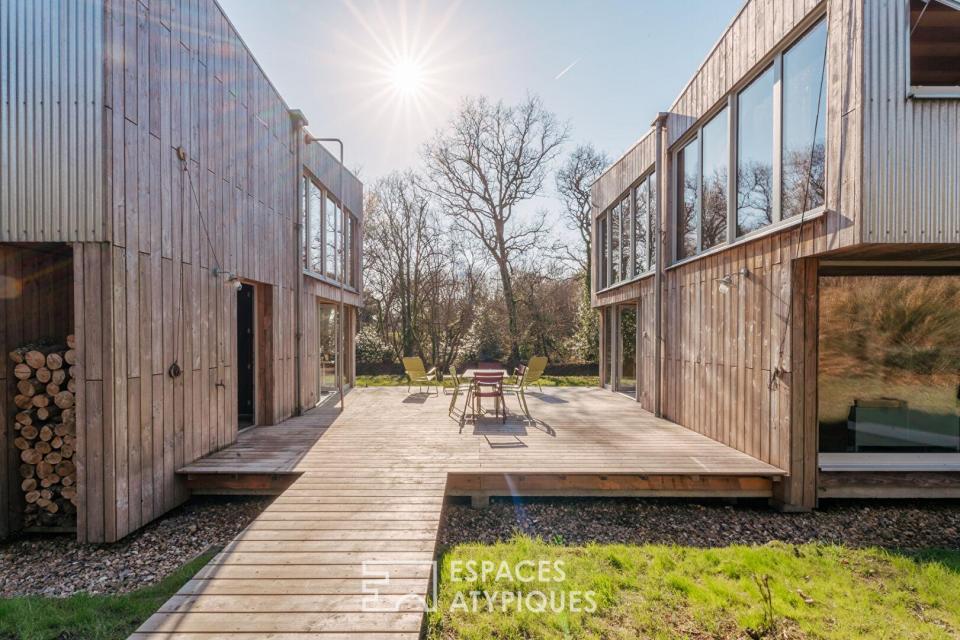 Maison d'architecte éco-conçue et son atelier indépendant à deux pas du centre-bourg