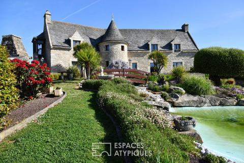 Maison en pierres avec vue mer