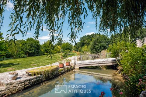 Ancien moulin de caractère du XIIIème siècle dans un cadre préservé et unique