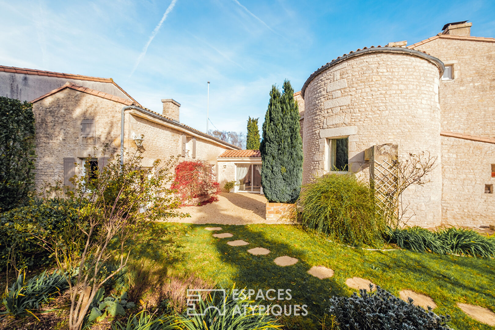 Charming old mill adjoining its house
