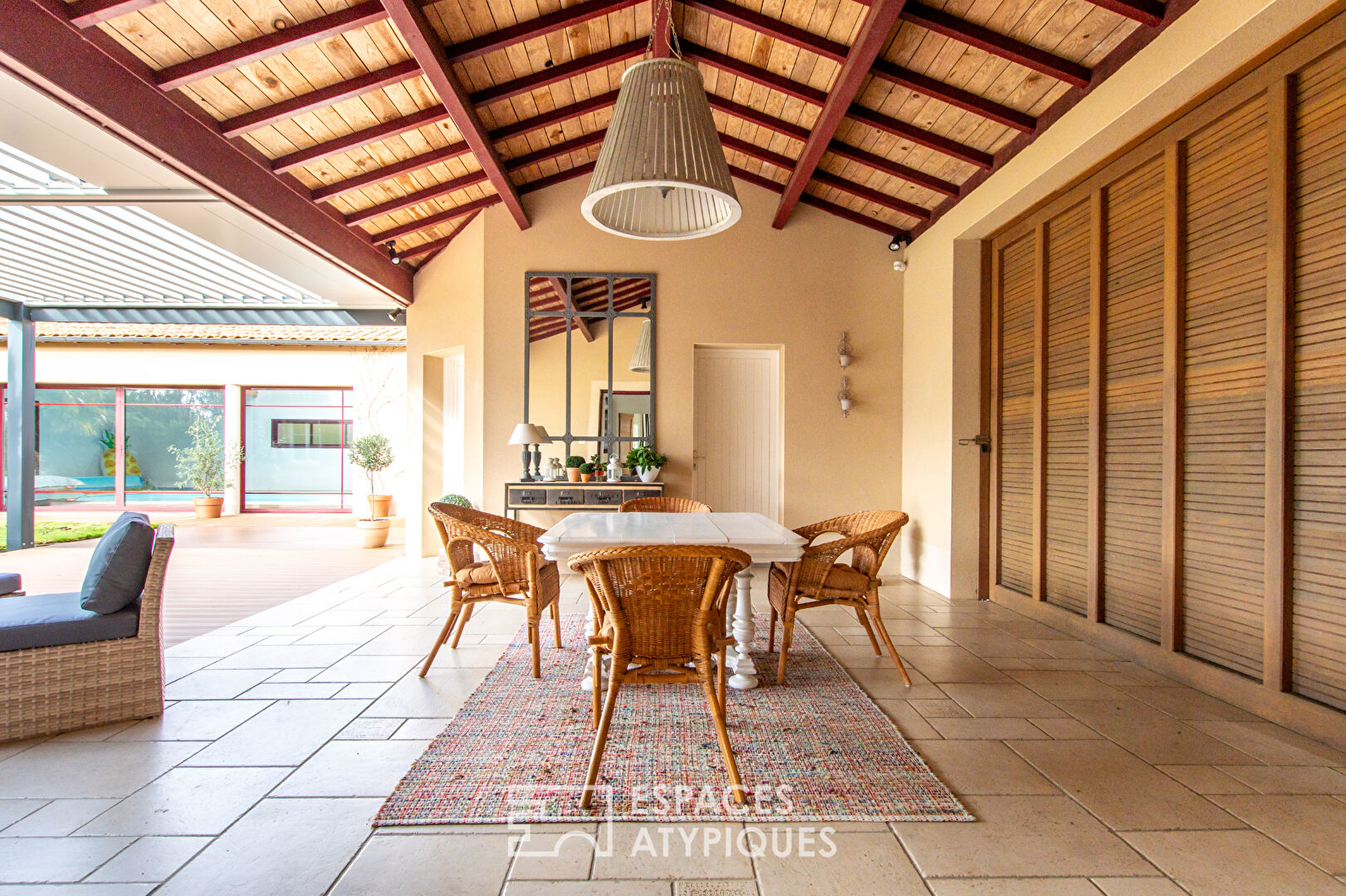 Single storey opening onto garden, terrace and indoor swimming pool