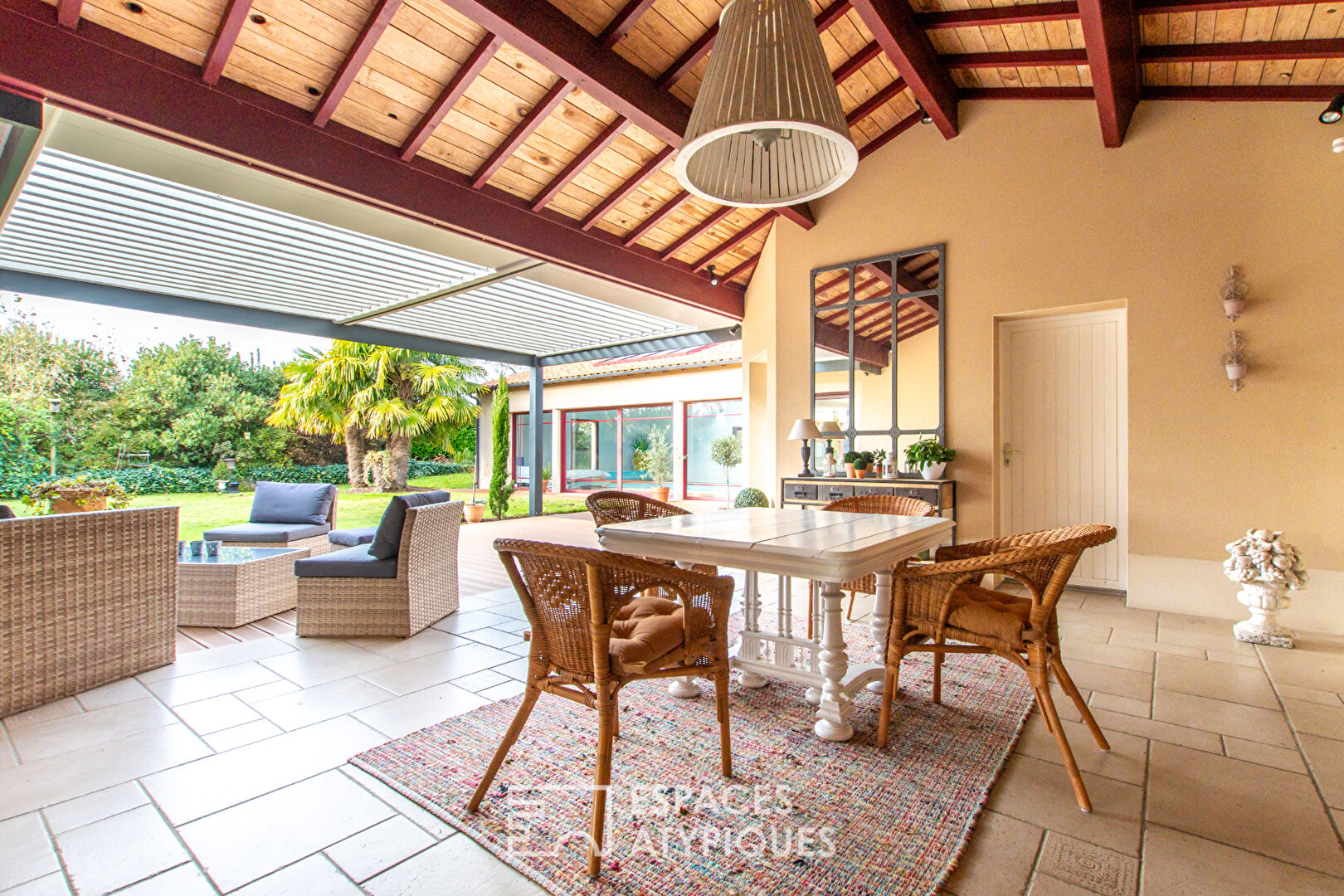 Single storey opening onto garden, terrace and indoor swimming pool