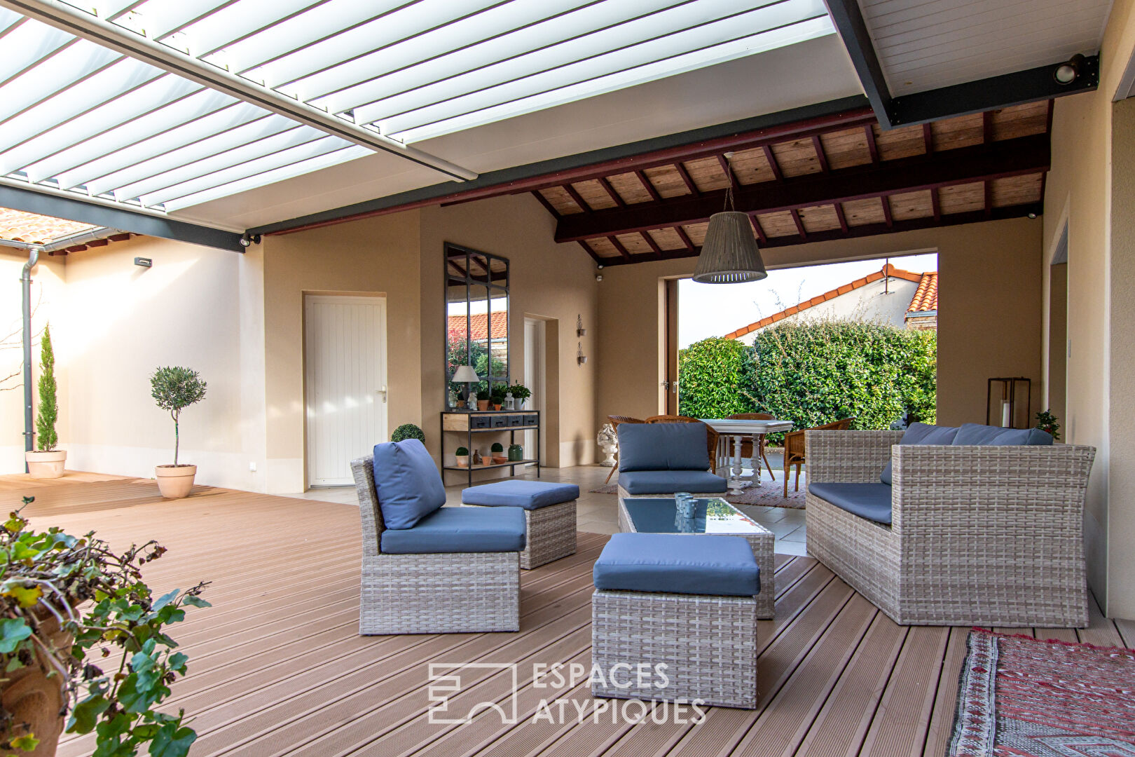 Single storey opening onto garden, terrace and indoor swimming pool
