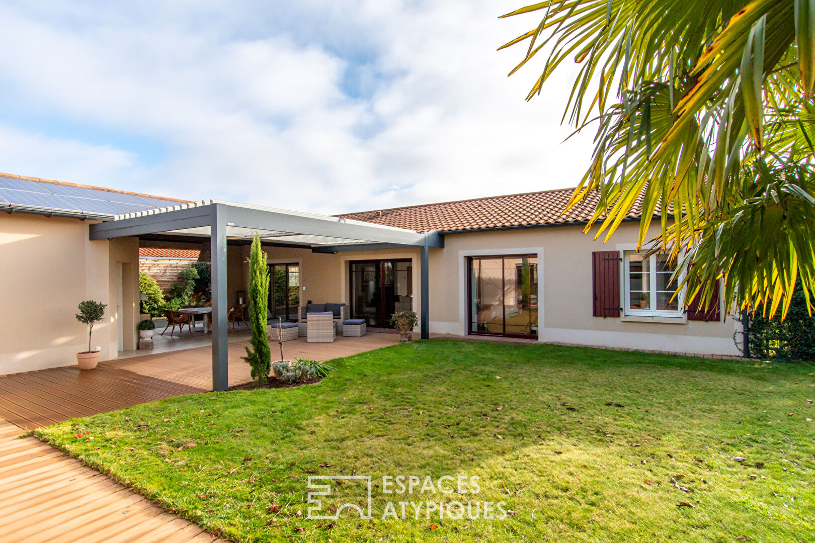 Single storey opening onto garden, terrace and indoor swimming pool