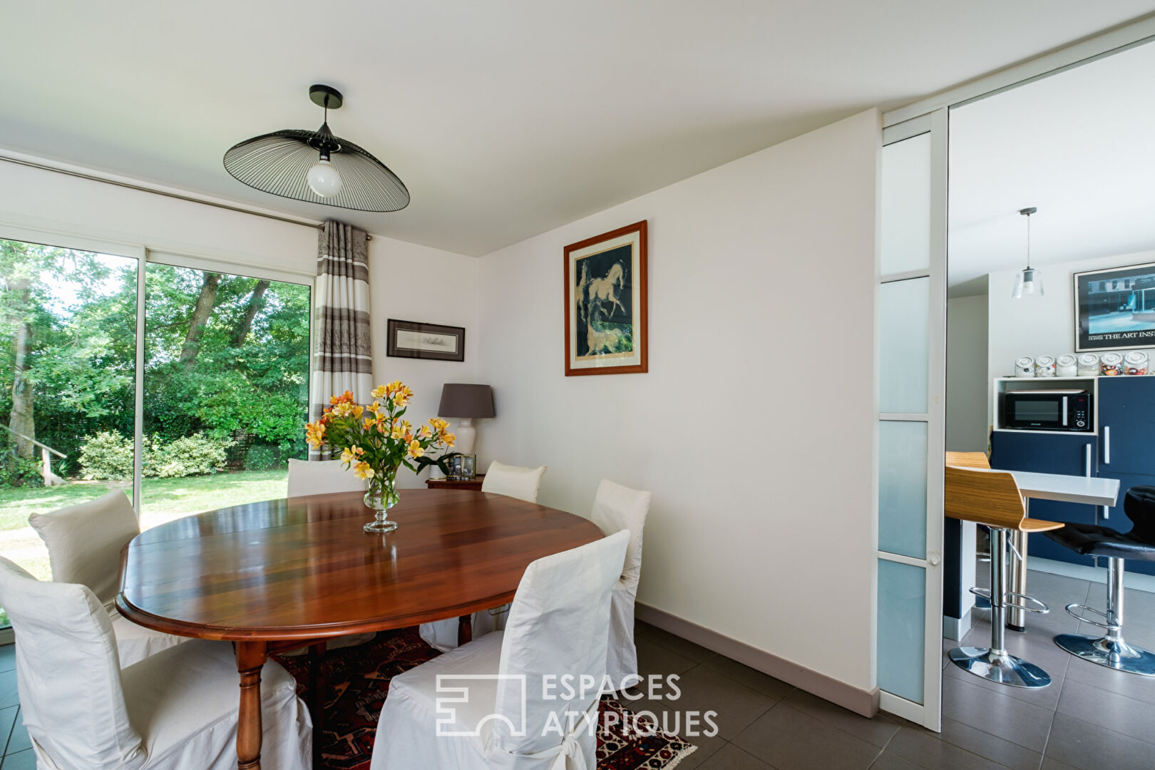 Contemporary in a wooded environment