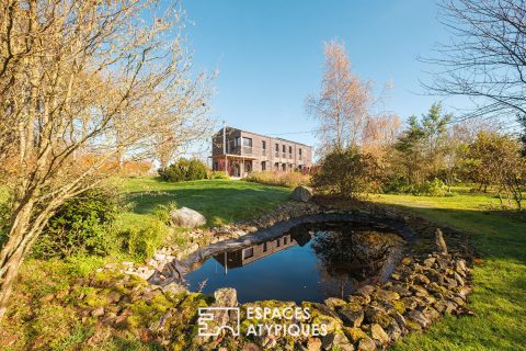 Maison d’architecte entre verger et prairie
