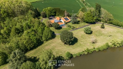 Propriété avec piscine intérieure, étang et parc boisé