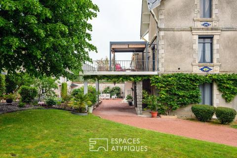 Maison de maître en coeur de ville avec jardin et espaces de vie évolutifs