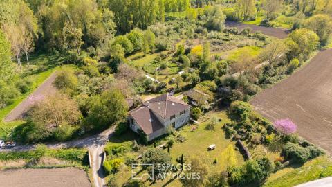Moulin du XVI revisité au coeur d&rsquo;un écrin naturel