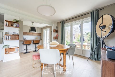 Lumineuse maison avec jardin arboré