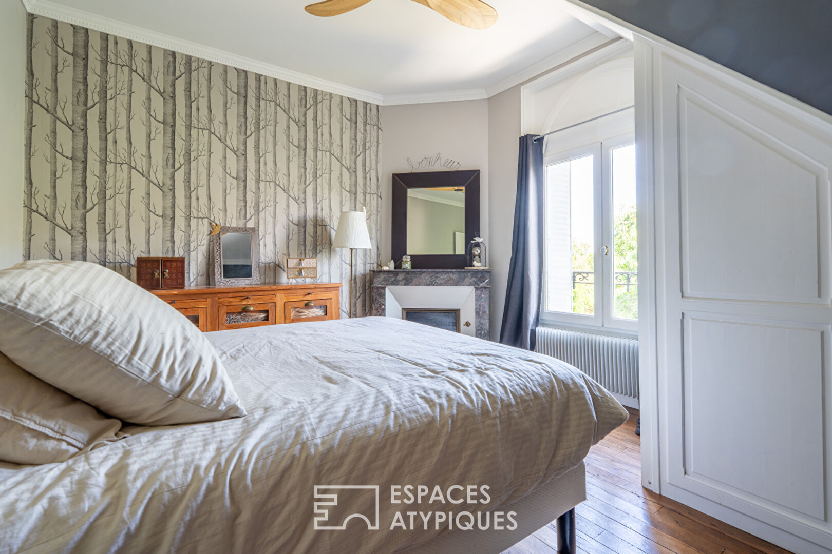 Maison de ville début XXème avec jardin arboré et garage