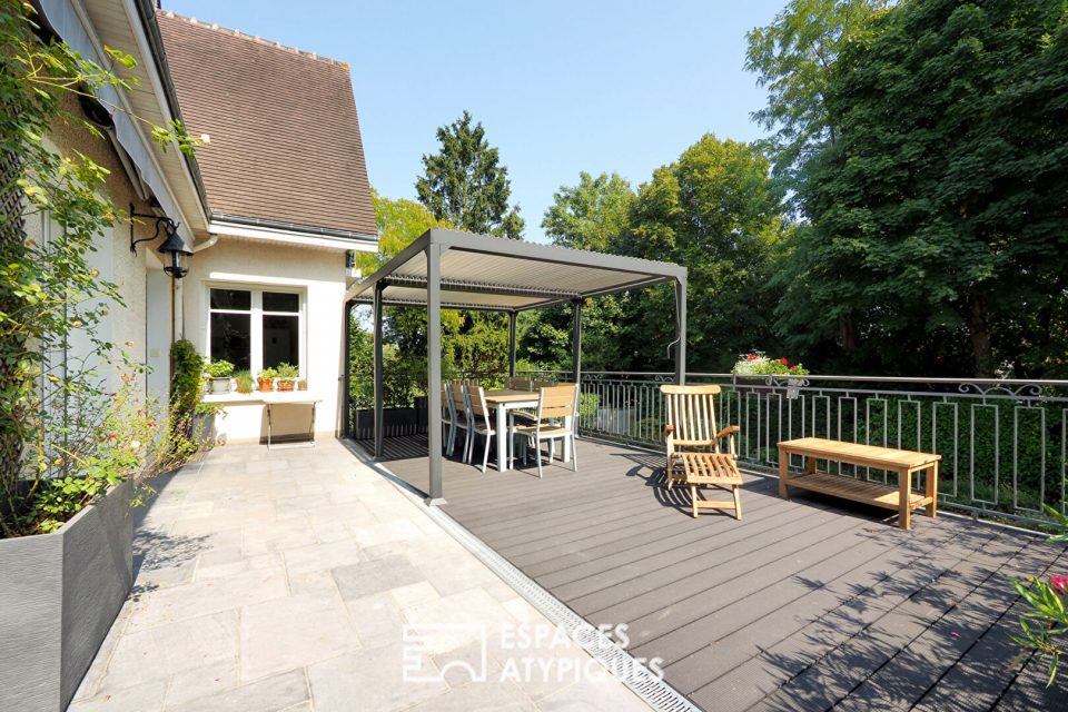 Propriété familiale avec terrasse et jardin arboré