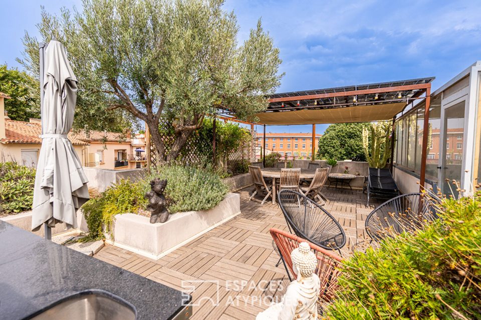 Maison de caractère avec toit-terrasse paysagé