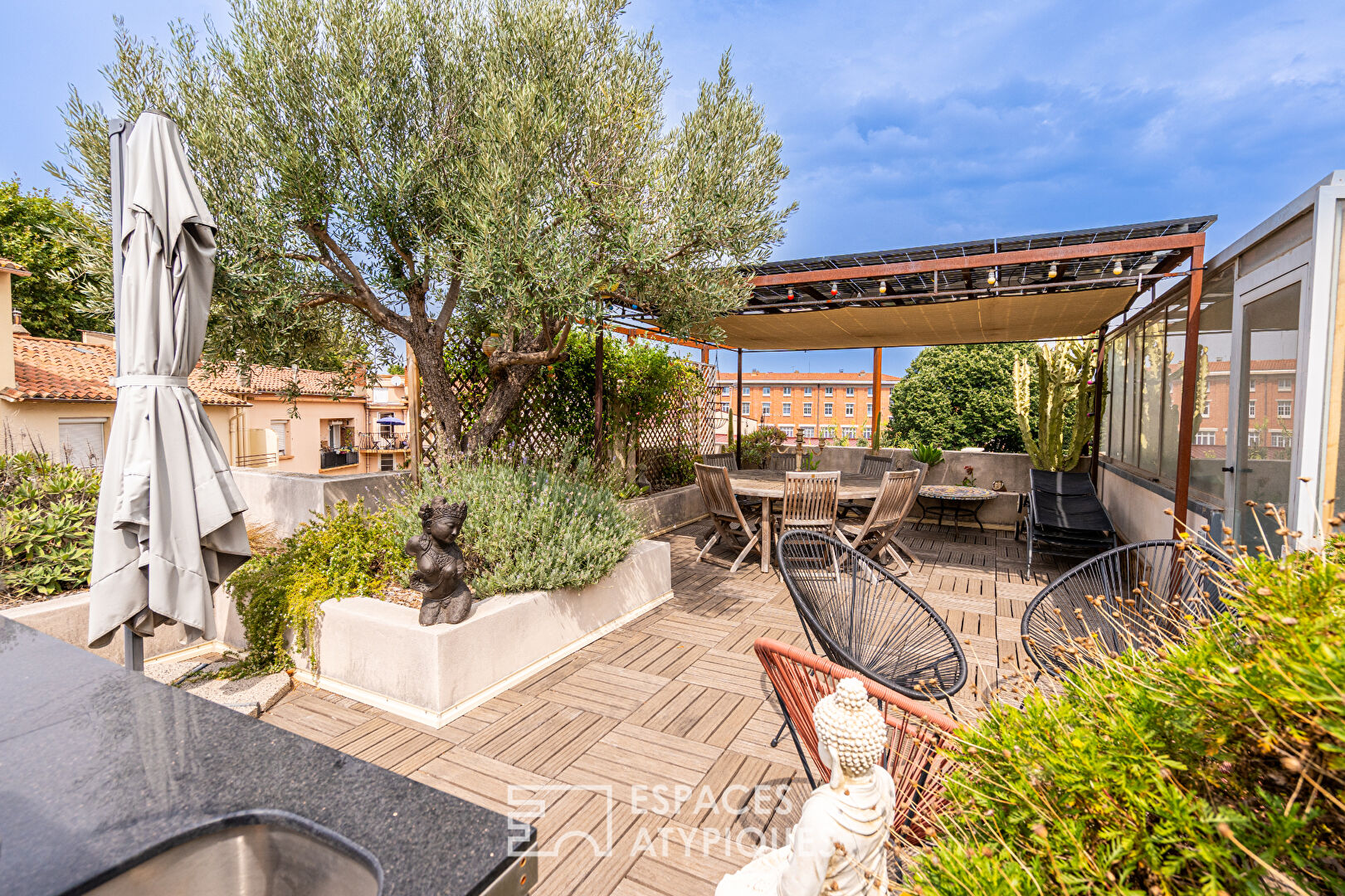 Maison de caractère avec toit-terrasse paysagé