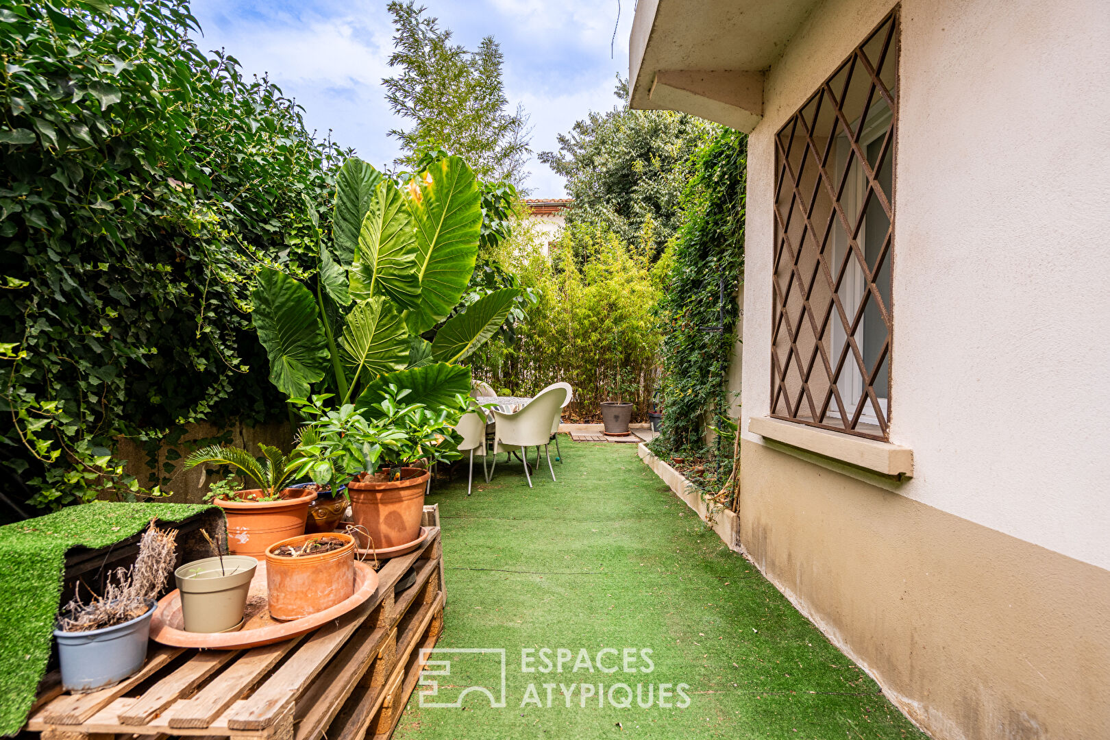 Maison de caractère avec toit-terrasse paysagé