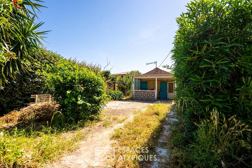 Maisonnette à réhabiliter avec jardin proche des plages saint-marinoises