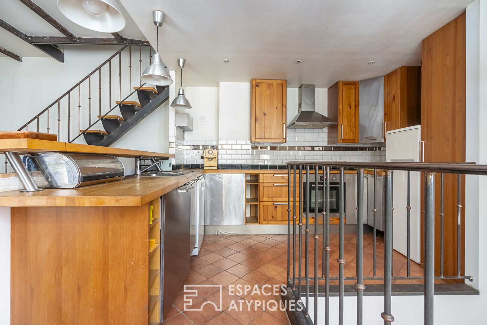 Triplex on the top floor overlooking the courtyard with balcony