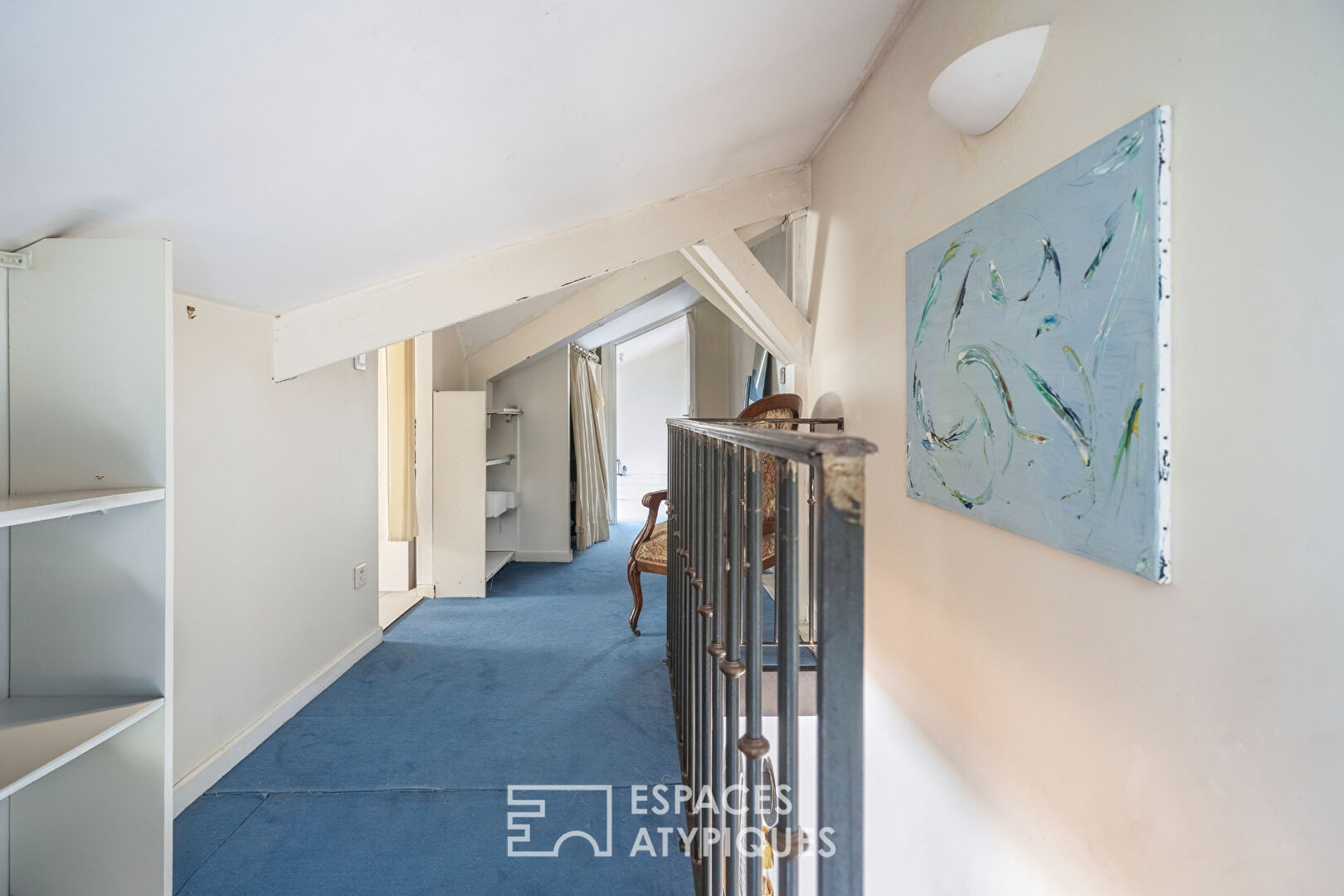 Triplex on the top floor overlooking the courtyard with balcony