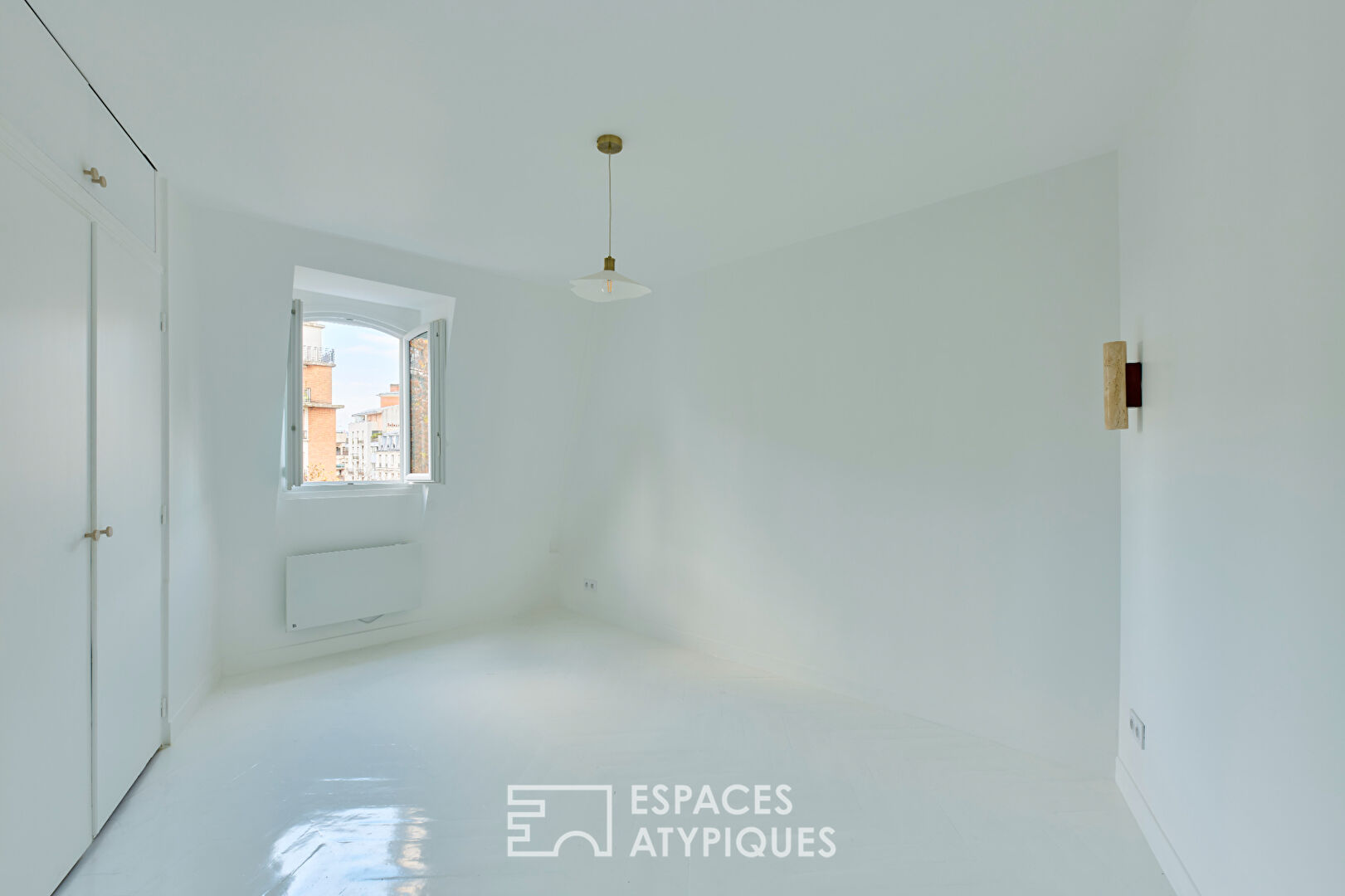 Dernier étage de charme refait par architecte