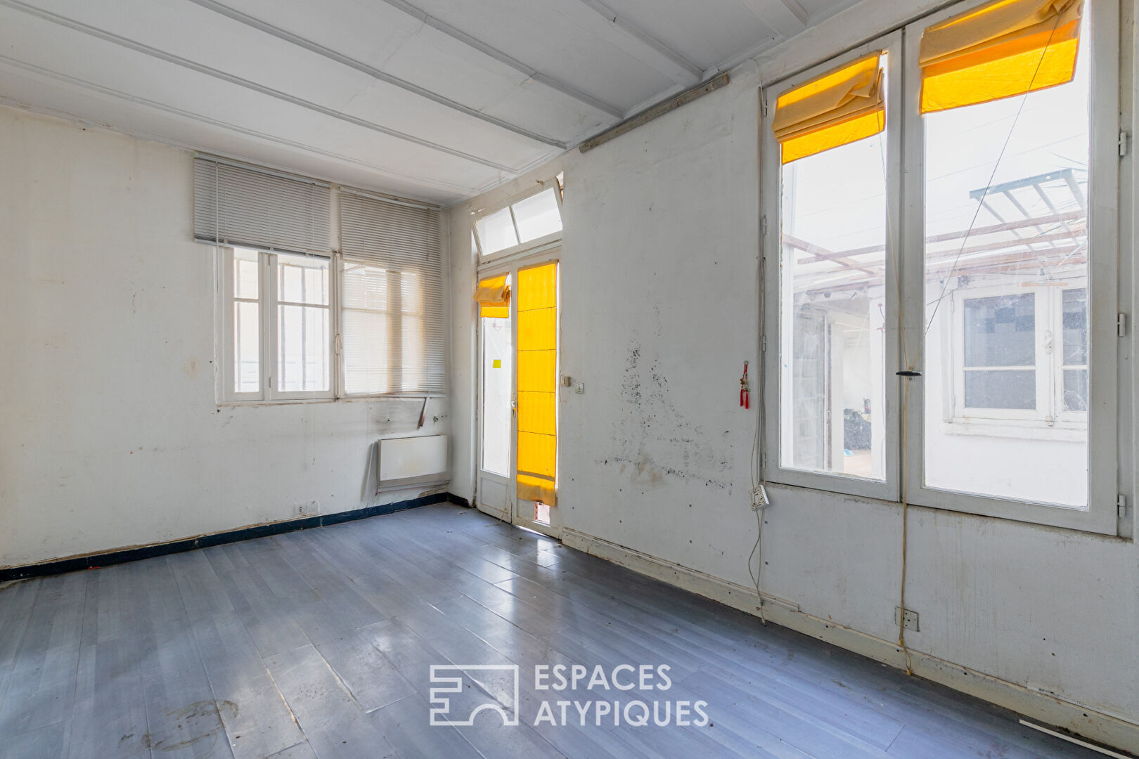 Ancien atelier avec jardin d&rsquo;hiver au Square Gardette