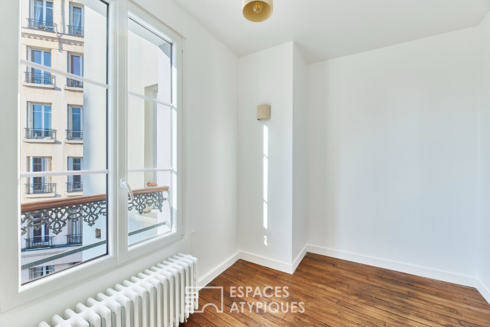 Appartement refait par architecte avec balcon