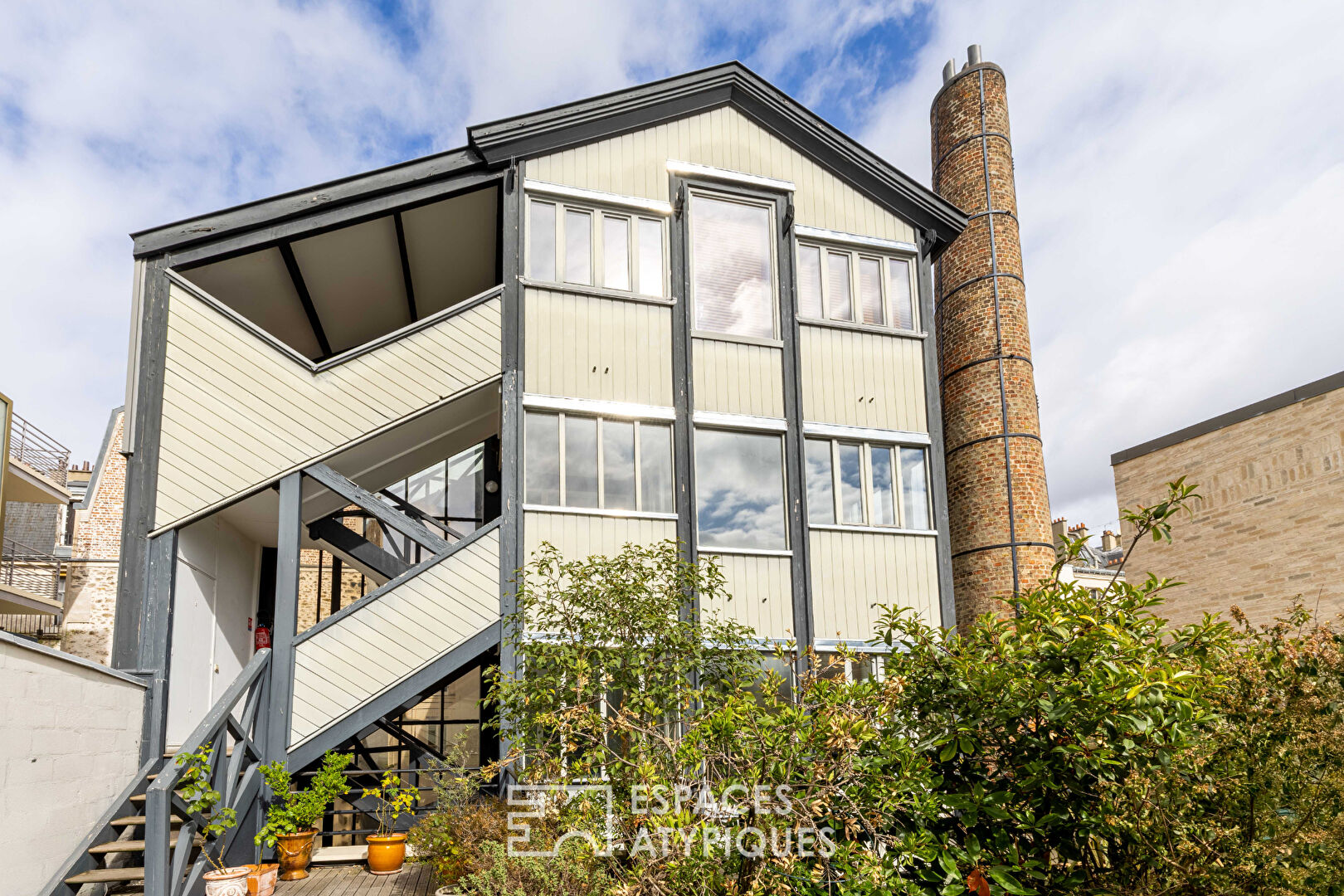 Appartement dans un ancien lavoir avec terrasse partagée