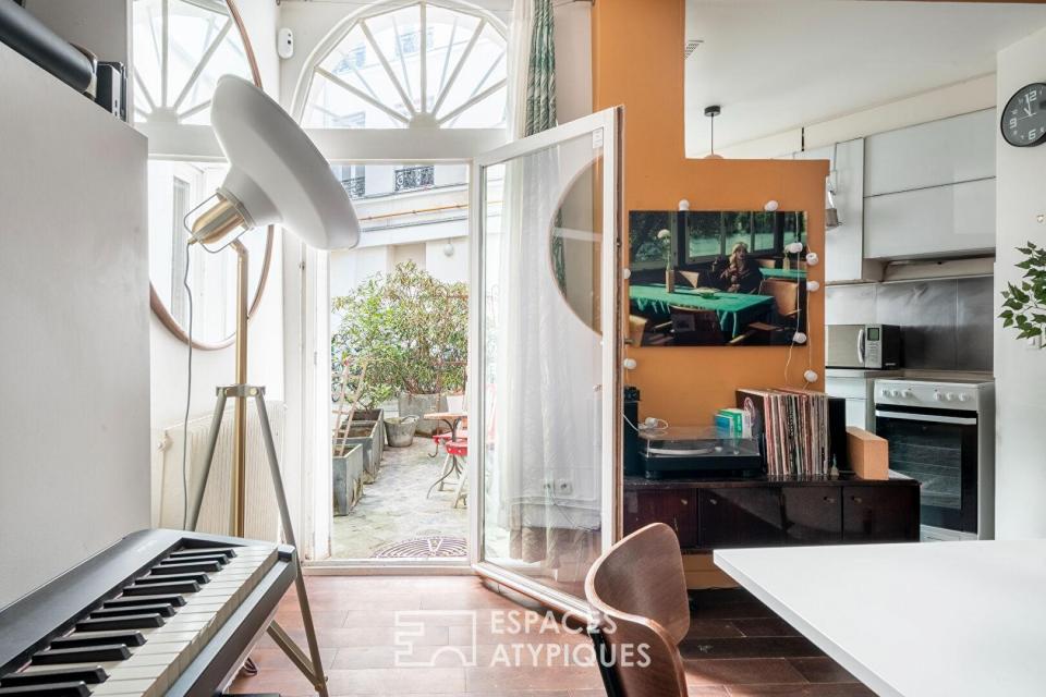 Rez-de-chaussée comme une maison sur cour