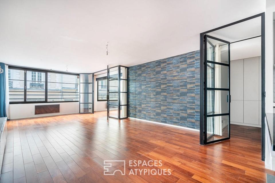 Loft à l'esprit industriel dans une ancienne manufacture des années 1930.