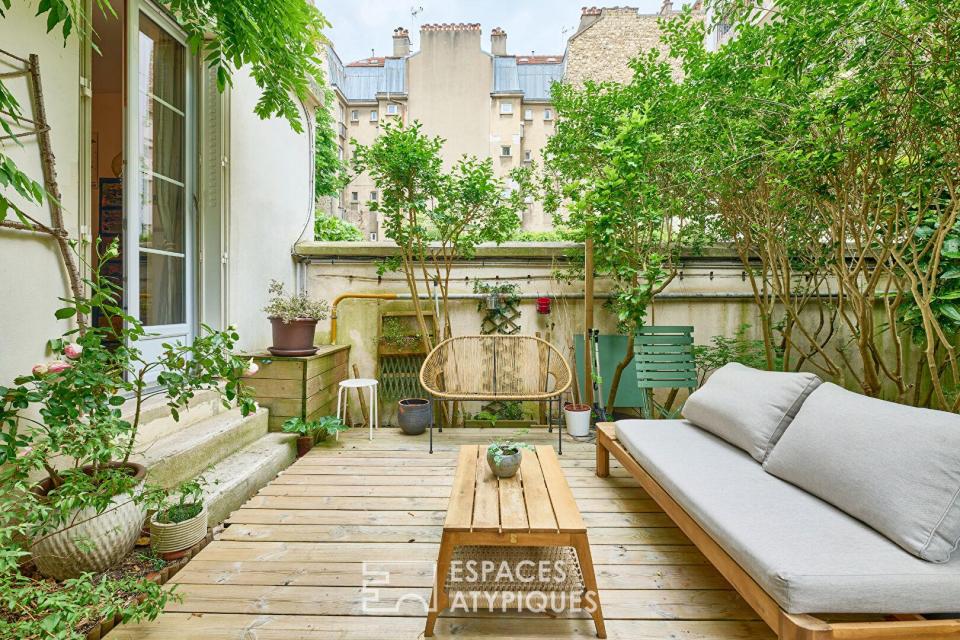 Duplex sur cour avec son jardin arboré