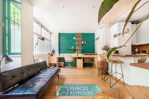 Ancien atelier revisité en habitation, au coeur d&rsquo;une cour végétalisée