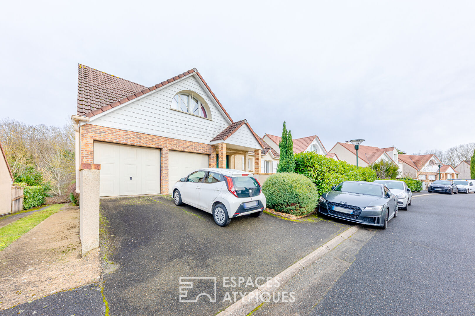 Volumes cathédrale et échappée verte : une signature architecturale à Cergy les Essarts