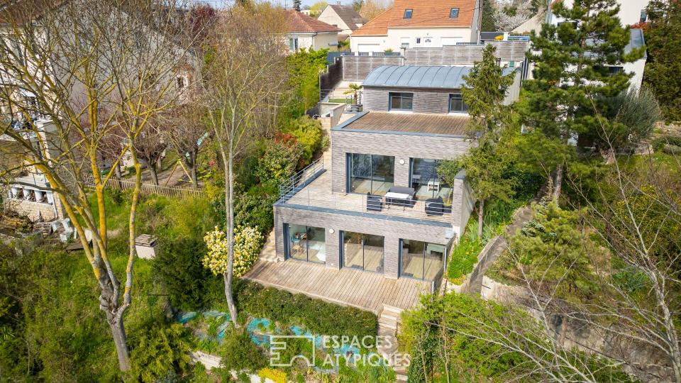 Panorama d'exception : Maison d'architecte haute performance à Herblay-sur-Seine