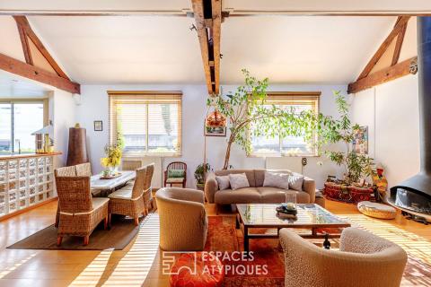 A magnificent loft in absolute tranquility. Just steps from the lake and the town center of Enghien-les-Bains.