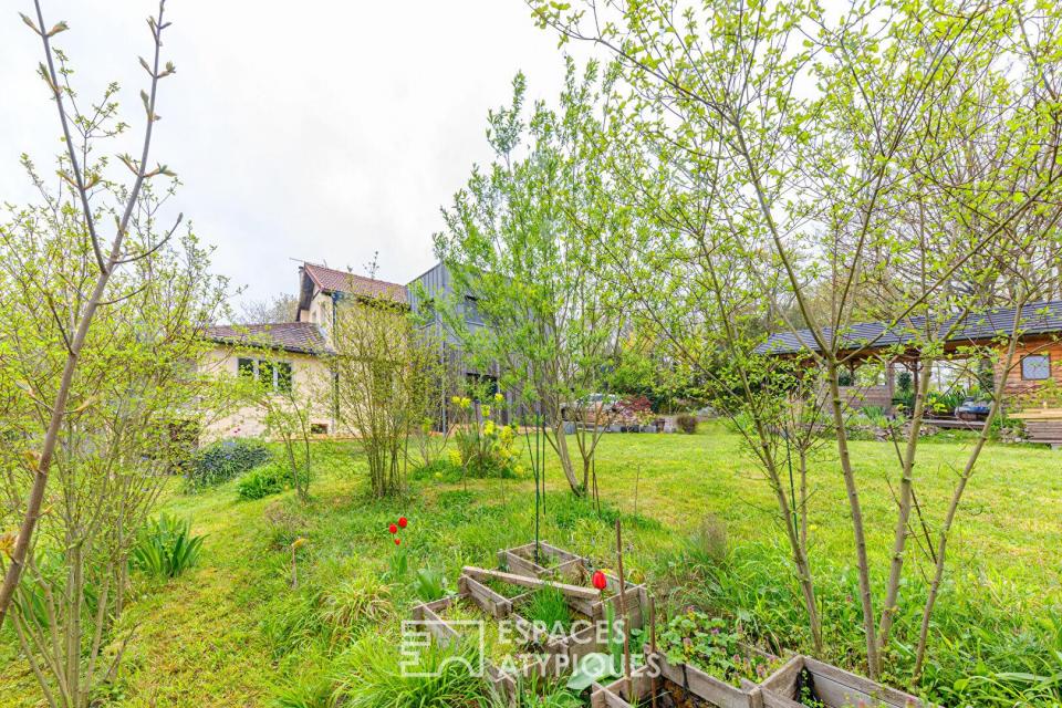 Dualité architecturale : Quand l'extension cubique sublime la tradition à Osny