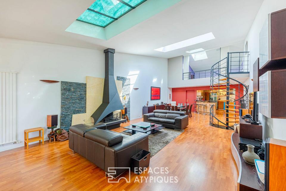 Loft singulier et volumes magistraux dans les anciens entrepôts SNCF d'Argenteuil