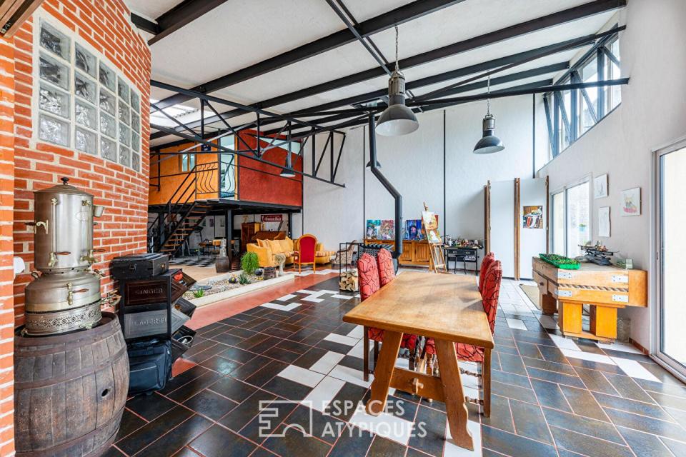 Loft unique au coeur du village de Montigny. Expression pure, volume et lumière !