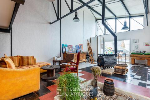 Loft unique au coeur du village de Montigny. Expression pure, volume et lumière !