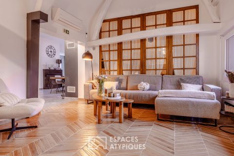 Loft de caractère dans une ancienne salle des fêtes, à deux pas de la ville