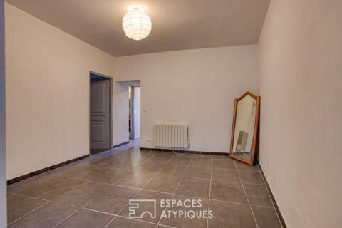 Appartement de charme avec cour extérieure en plein coeur de village