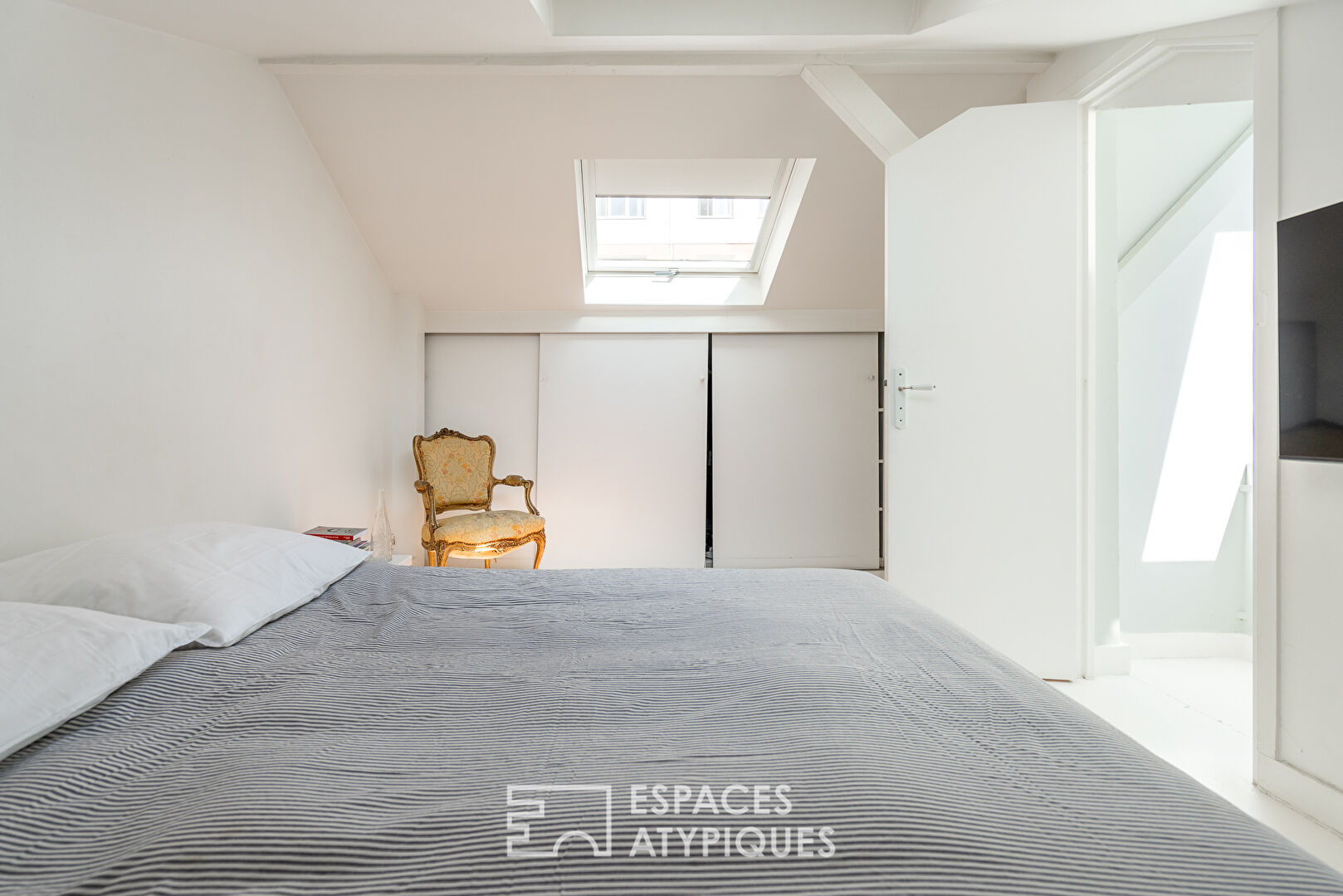 Duplex traversant au dernier étage
